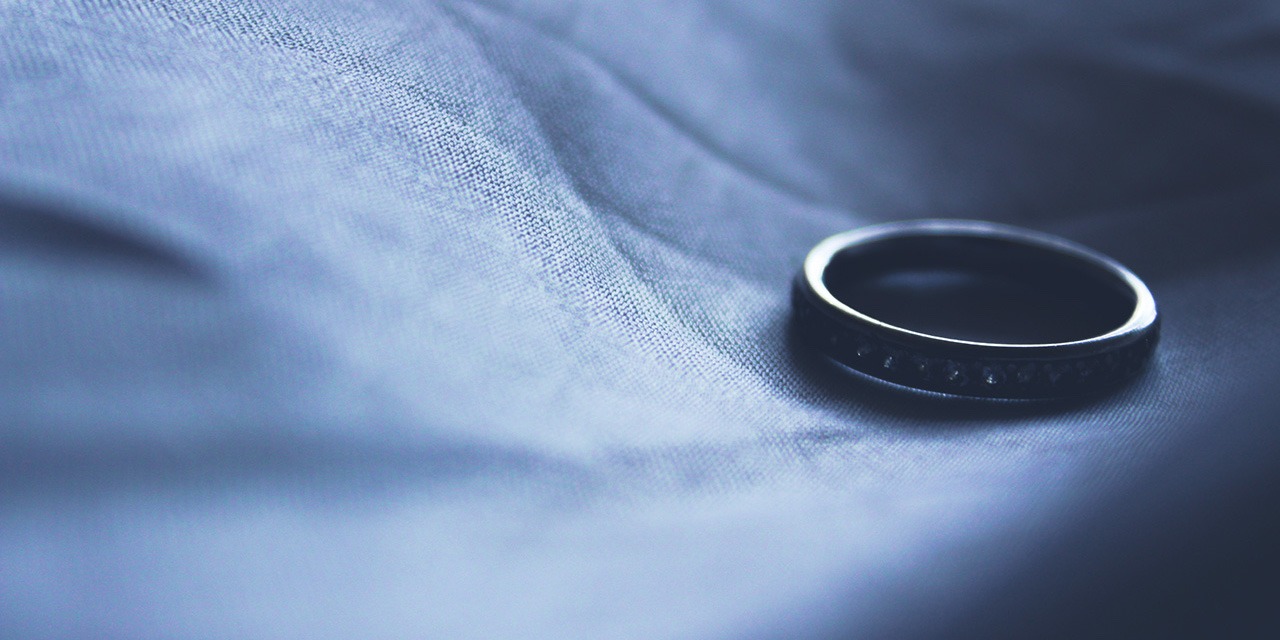 wedding-ring-left-on-bed