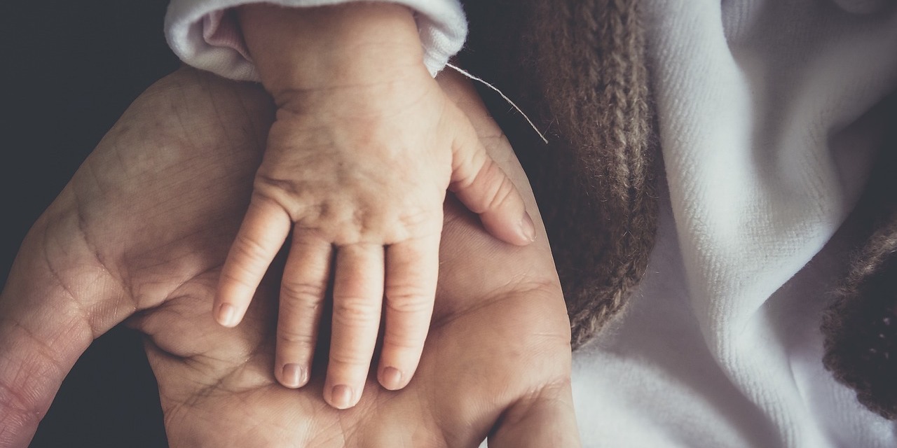 babys-hand-on-parents-palm