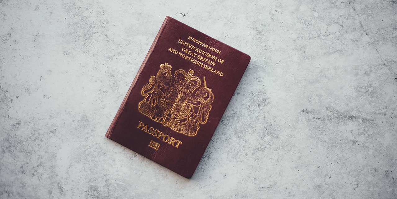 uk-passport-on-grey-stone-surface