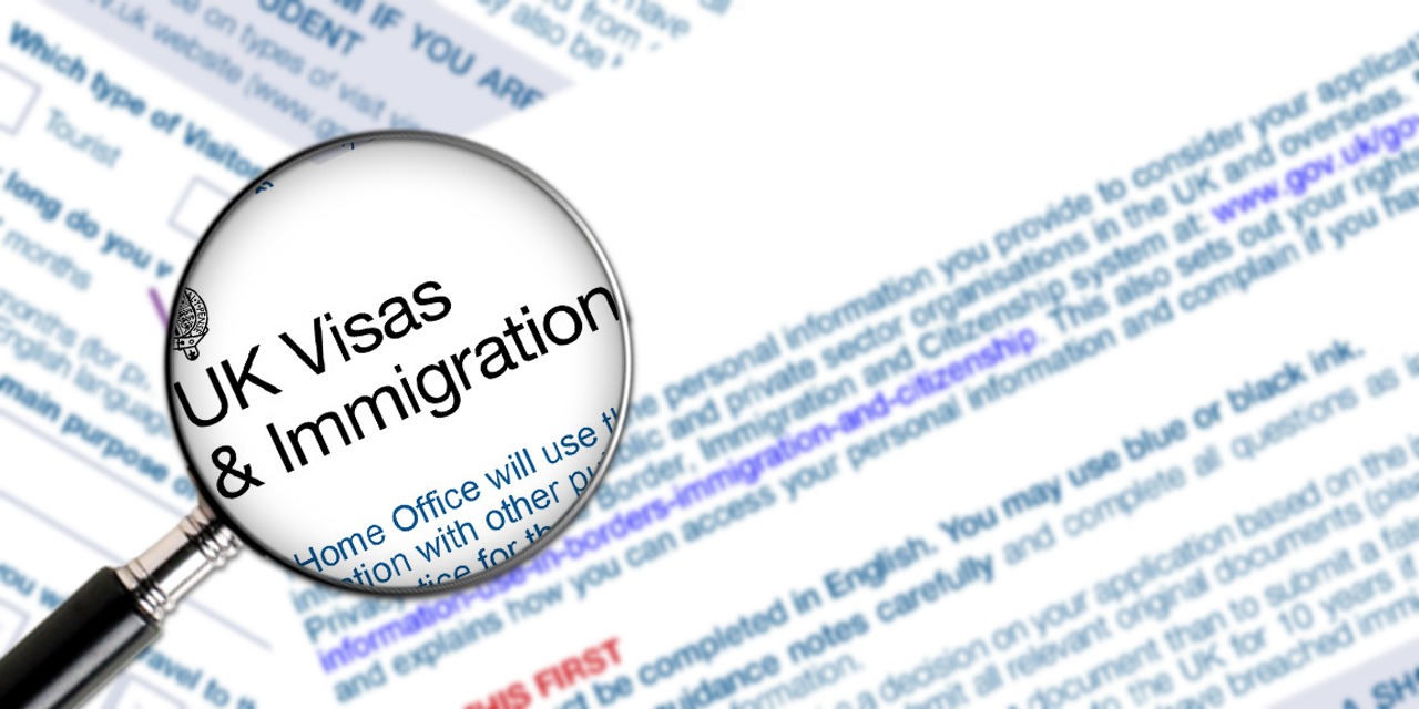 uk-visa-refusal-administrative-review-magnifying-glass