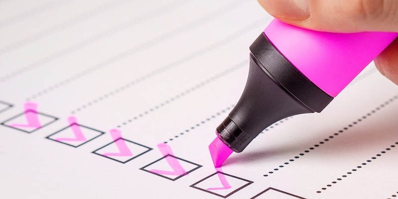 making-a-checklist-with-a-pink-highlighter