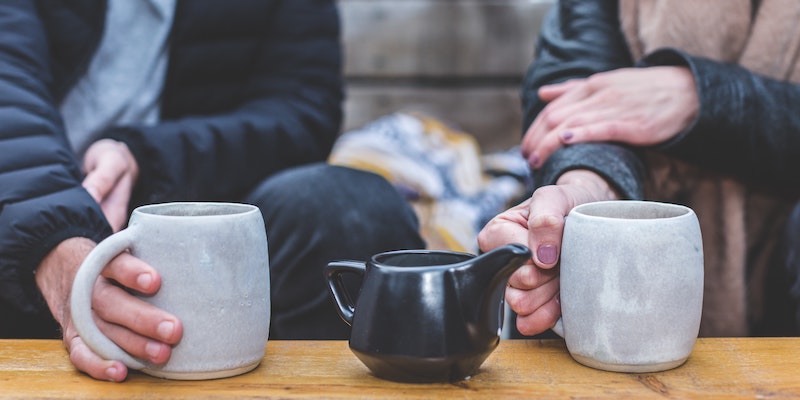 man-and-woman-drinking-coffee-together