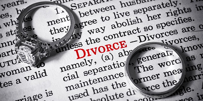 two-wedding-rings-on-dictionary-page-next-to-divorce-definition